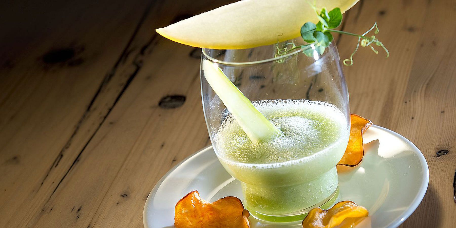 Getränk mit Gurke und Melone als kulinarisches Highlight des Hotelrestaurants